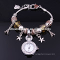 Nouvelle arrivée Lady glass beads eiffel towerl et star charms quartz montre-bracelet femme